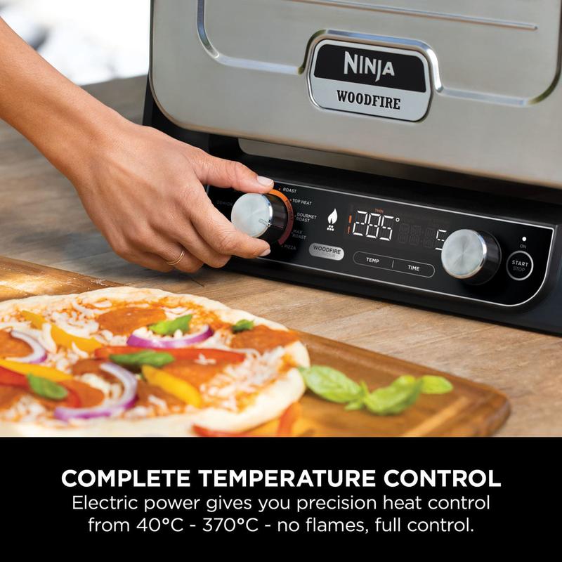 Ninja Woodfire Electric Outdoor Oven + Cover + Pizza Peel Bundle, 8-in-1 Pizza Oven, High-Heat Roaster & BBQ Smoker with Roast Rack, Pro-Heat Tray, Pizza Stone, Wood Pellets & Scoop, 6 Pizza Settings, Burnt Orange OO101UK